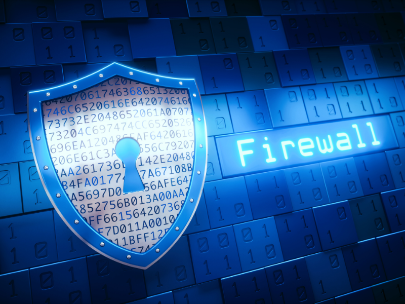 A digital shield filled with code and a keyhole icon, positioned next to the word “Firewall,” symbolizing network protection and the role of firewalls in cyber security solutions.